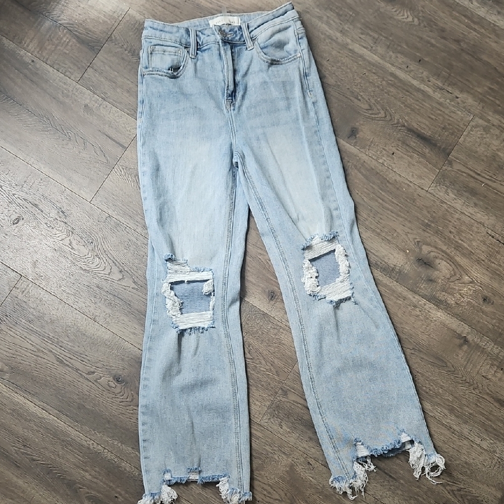 Distressed Light Blue High-Rise Cropped Women's Jeans